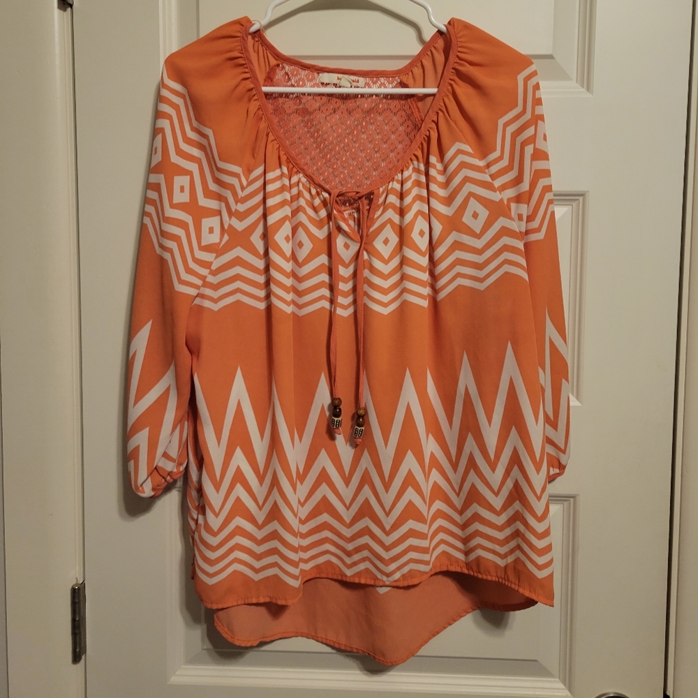 Orange and white blouse